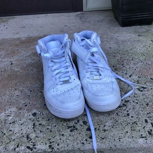 Nike Air Force Ones all white high top